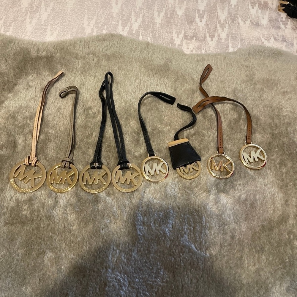 Michael Kors Gold Logo Keychain Set with Black and Brown Straps. Each is $16